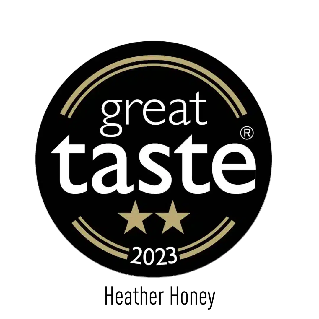 A black circular badge with gold accents reading "great taste" in white text, two gold stars below, and "2023" at the bottom, indicating a 2023 Great Taste Award.