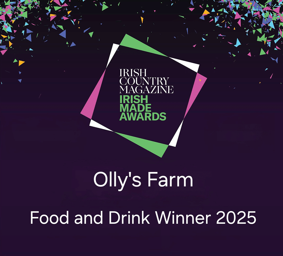 A colorful confetti background with the Irish Country Magazine Irish Made Awards logo. Text below reads: “Olly's Farm Food and Drink Winner 2025.”.