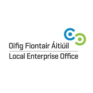 Logo for the Local Enterprise Office with text in Irish, "Oifig Fiontair Áitiúil," and English, "Local Enterprise Office." Above the text are two interlinked circular shapes, one blue and one green.