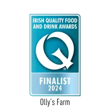 A blue and white badge with a large Q symbol and the text "Irish Quality Food and Drink Awards Finalist 2024.